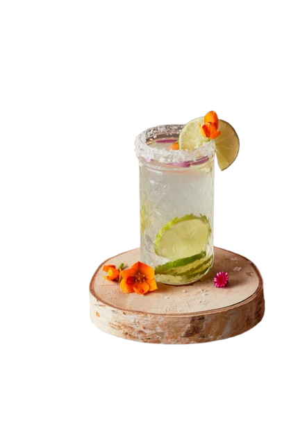 Fresh mocktail with mint, lime, fruits and ice in aesthetic green background
